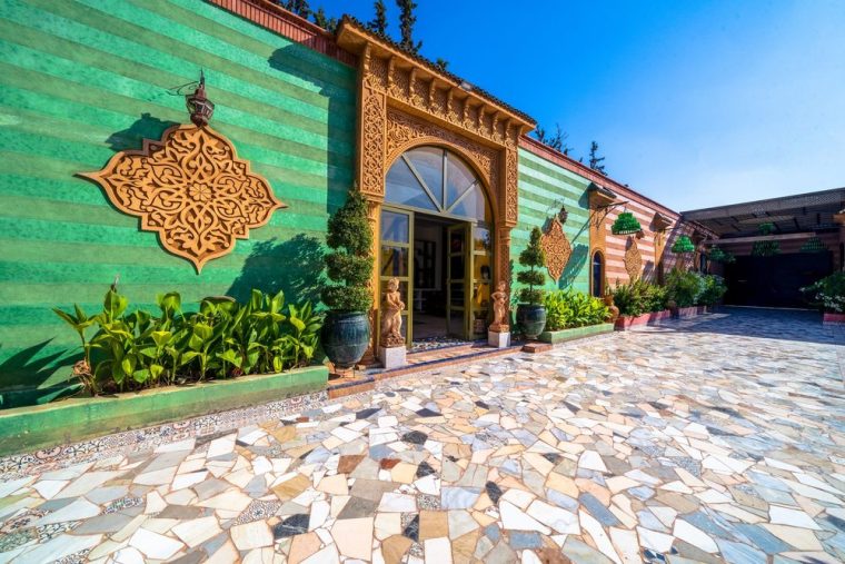 Carved emerald gate and mosaic paving
