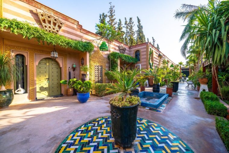 Entrance patio of a room, carved plaster and glazed tile