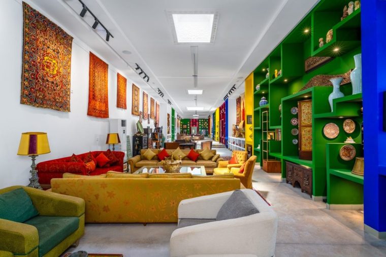 Collected objects and carpets hung on the walls
