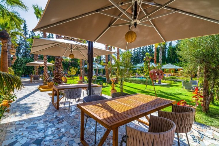 A table for two shaded by the parasols
