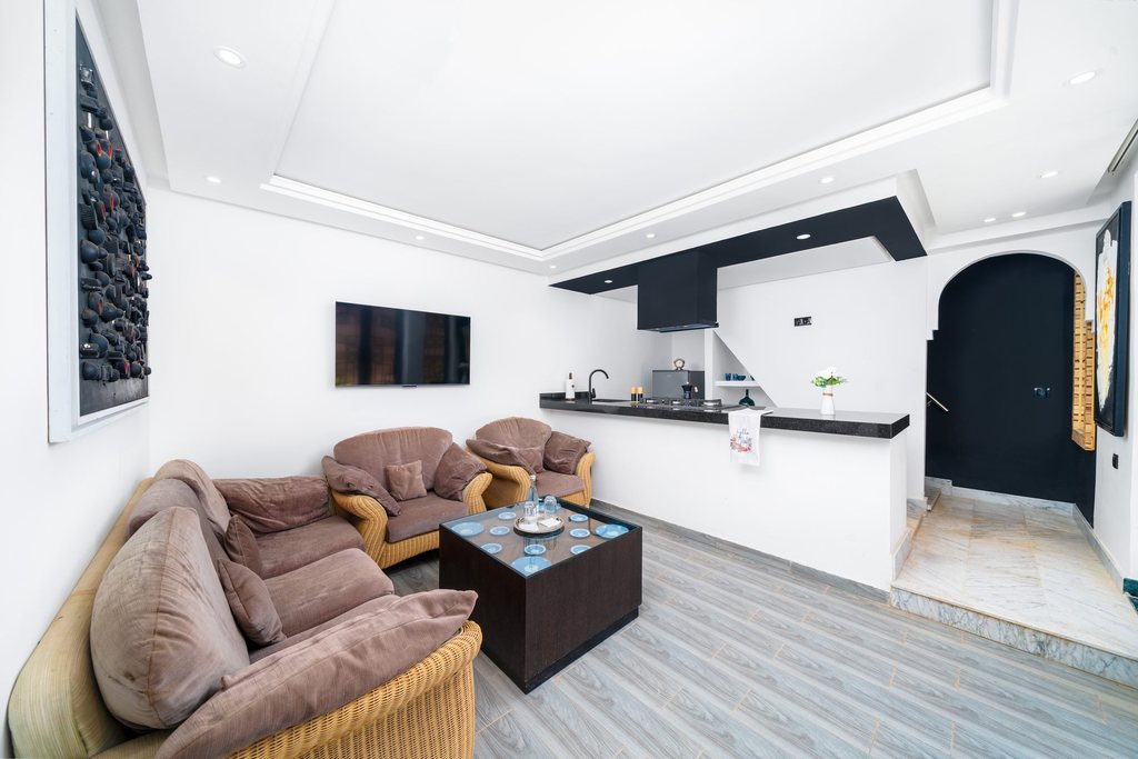 Sitting area of the apartment, sofas and a low table