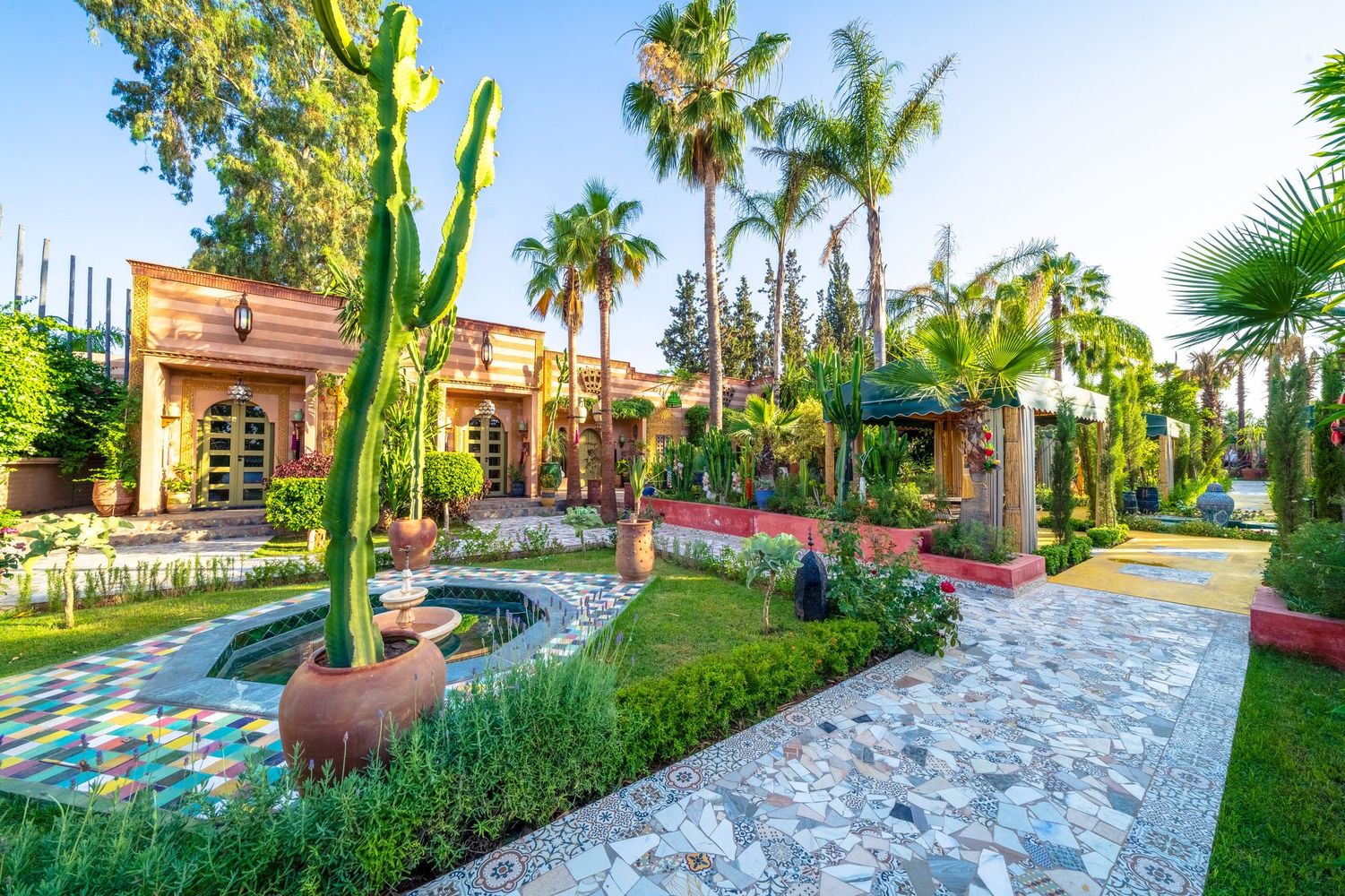 The gardens of Jnane Rihane, cactus borders and pavilions on the road out to the Atlas