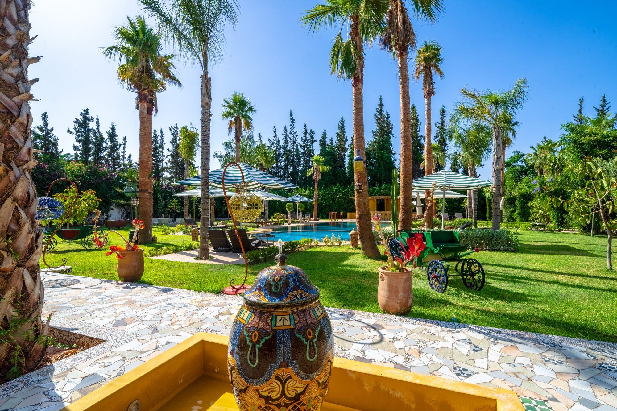 Palm groves and landscaped gardens across the Jnane Rihane estate