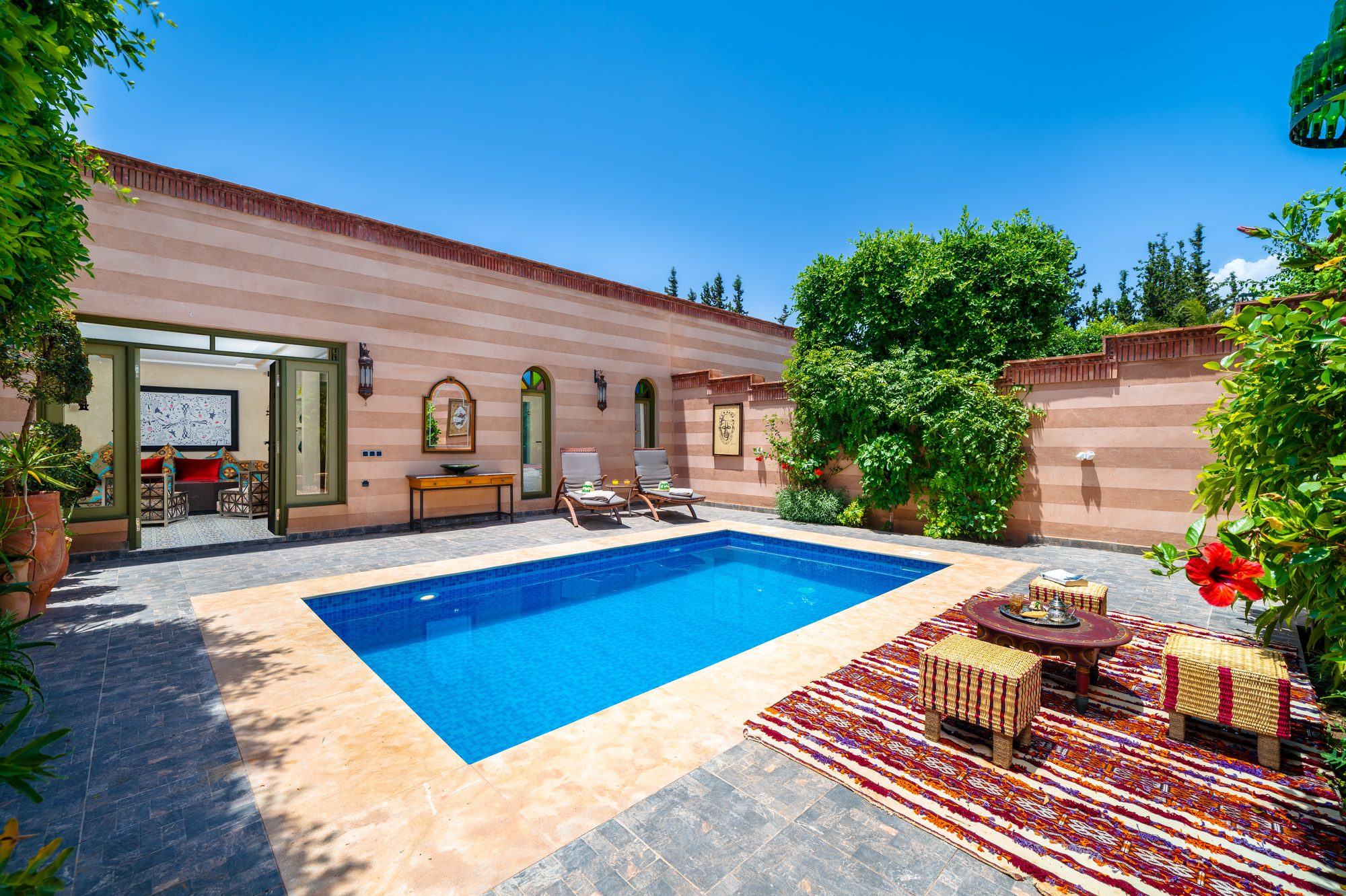 Private pool in the walled courtyard of a suite at Jnane Rihane