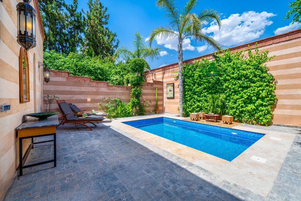 Walled courtyard and private pool of a suite at Jnane Rihane